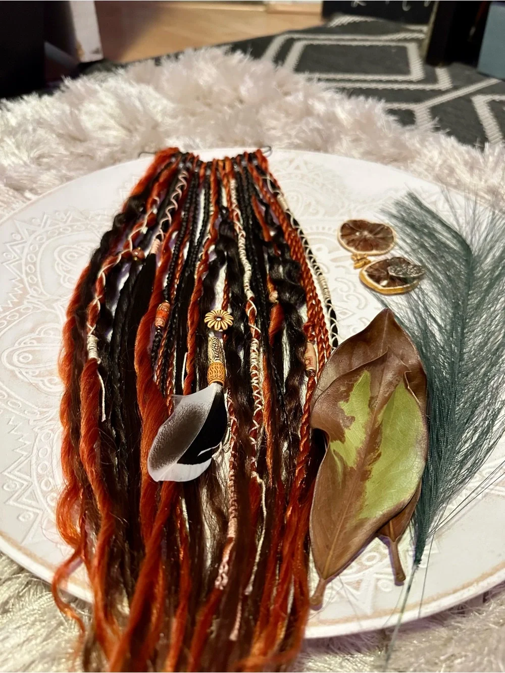 Blonde Hair Extensions with Black and Orange Braided Accents